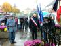 Devant le monument aux morts.