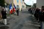 Devant le monument de la rue du 16 juillet.